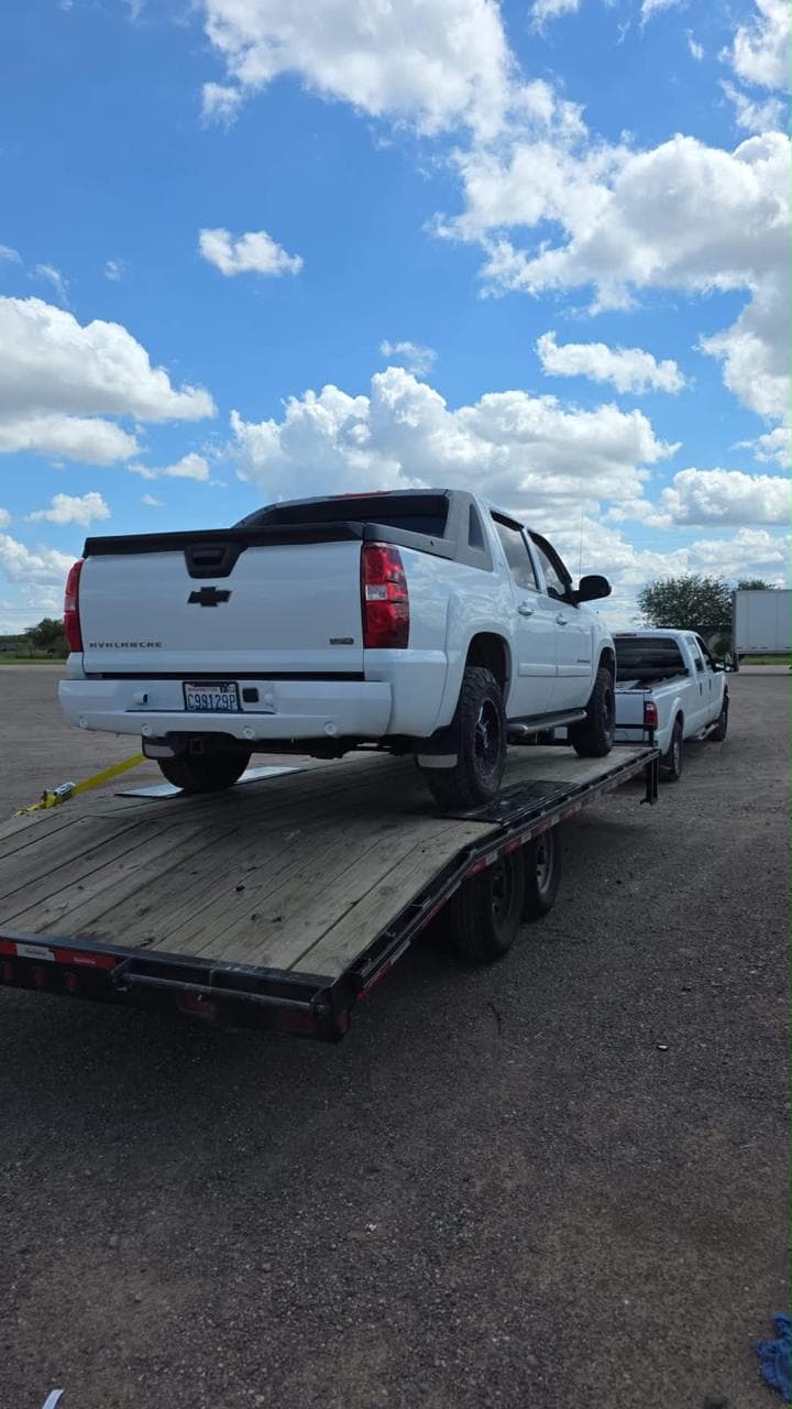 Chevy Avalanche on a gooseneck
