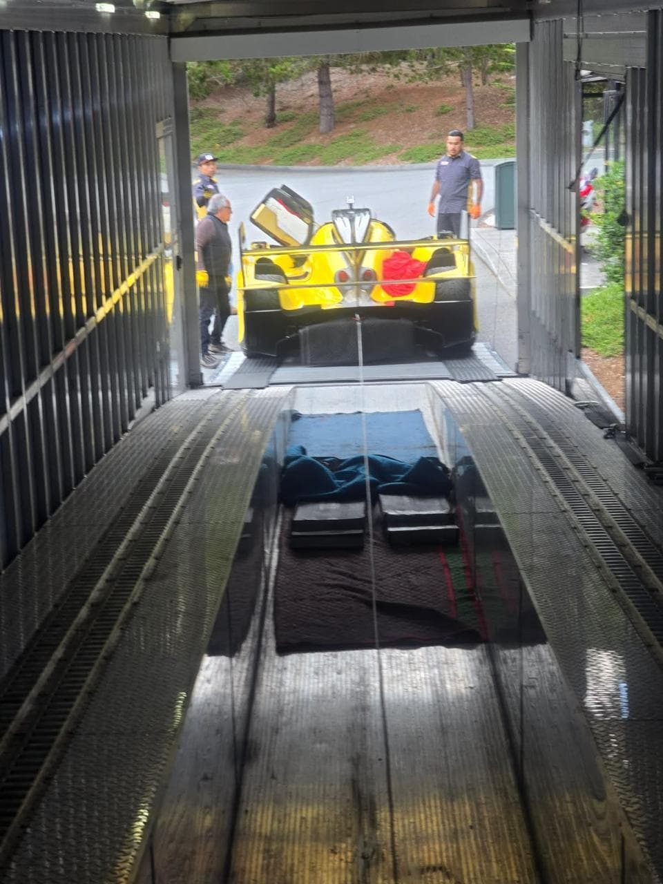 Le Mans race car loaded into enclosed transport